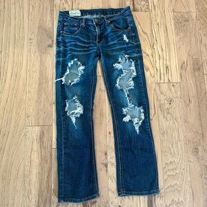 Machine Heavily Distressed Medium Blue Denim Bootcut Jeans, size 31